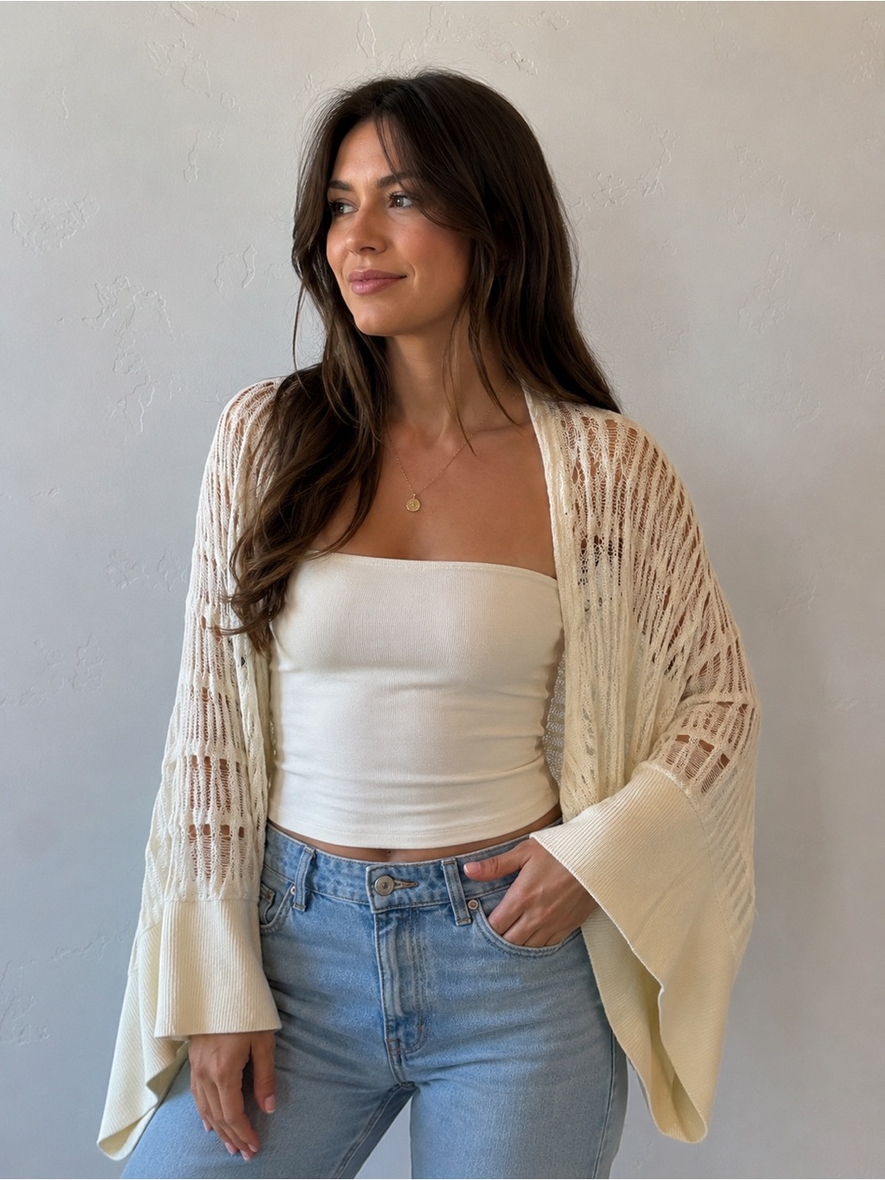 Alice + Olivia white knit cardigan with an open-front design